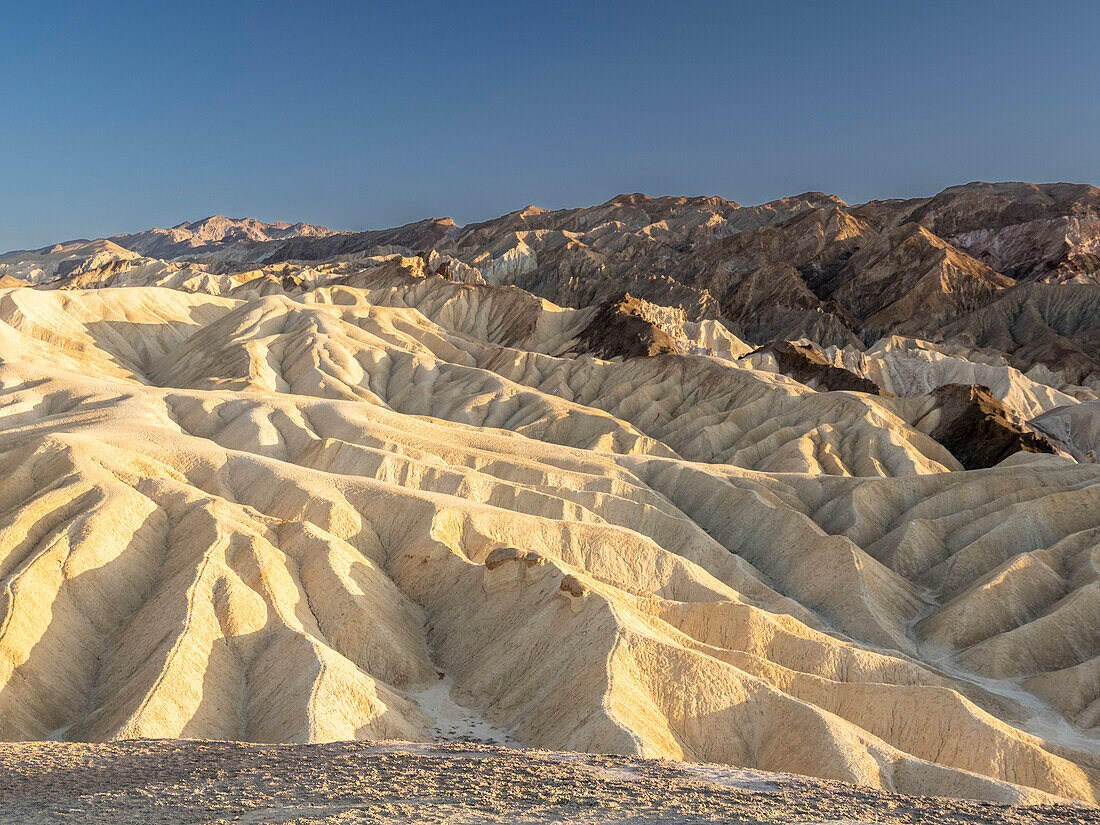 A view of Zabriskie Point at sunset, Amargosa Range, Death Valley National Park, California, United States of America, North America