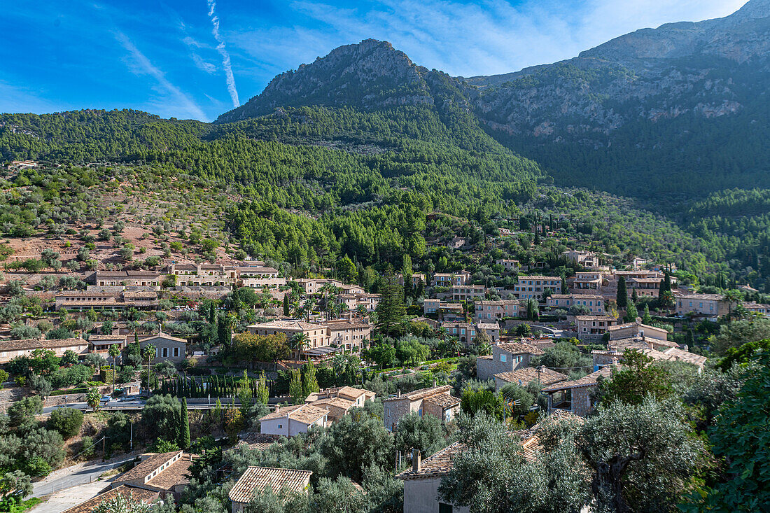 Aerial of the mountain village of Deia, Serra de Tramuntana, UNESCO World Heritage Site, Mallorca, Balearic Islands, Spain, Mediterranean, Europe