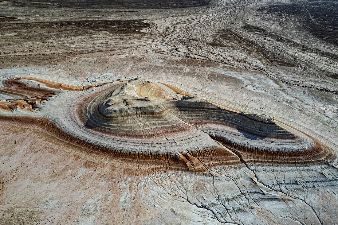 Aerial of multicoloured layers of sandstone, Kyzylkup, Mangystau, Kazakhstan, Central Asia, Asia