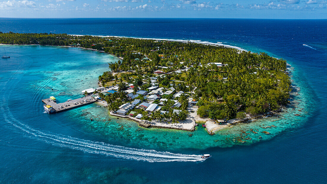 Aerial of the Tiputa Pass, Rangiroa atoll, Tuamotus, French Polynesia, South Pacific, Pacific