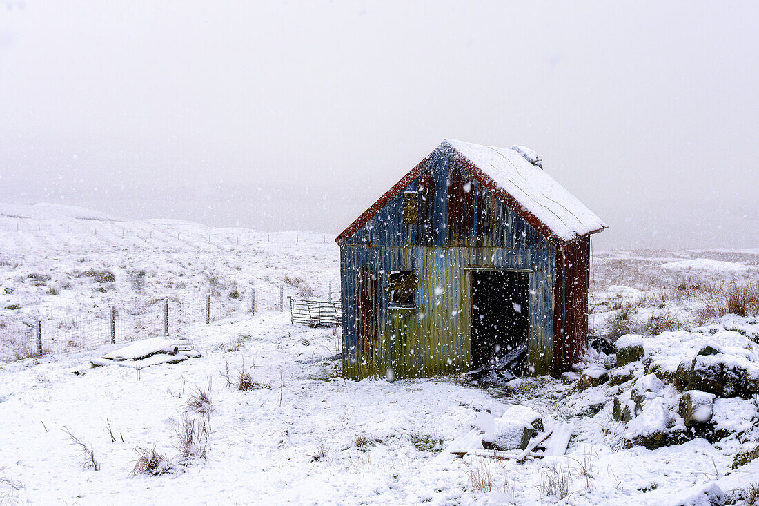 An old abandoned shed on a snowy winter's day, Isle of Harris, Outer Hebrides, Scotland, United Kingdom, Europe