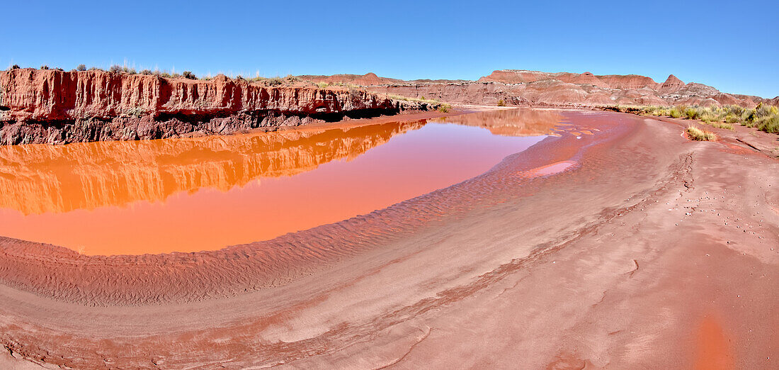 The red water of Lithodendron Wash, red from bentonite clay, in Petrified Forest National Park, Arizona, United States of America, North America