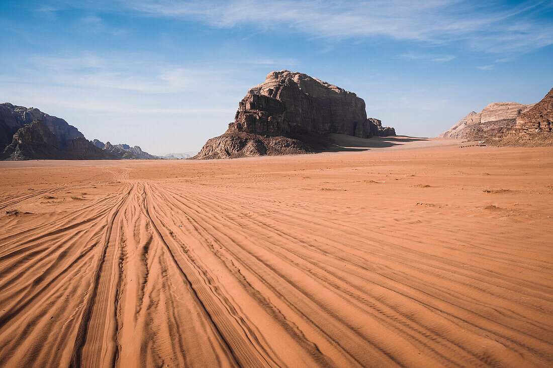 Tyre tracks in the sand in the Wadi Rum desert, UNESCO World Heritage Site, Jordan, Middle East