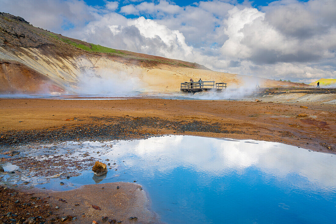 Tourists visiting geothermal area and hot springs at Seltun Hot Springs, Krysuvik, The Capital Region, Iceland, Polar Regions