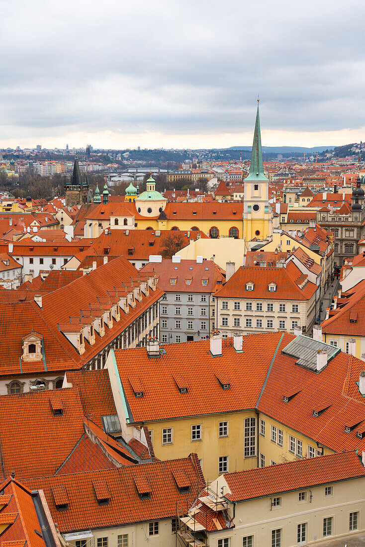 Red roofs of Lesser Quarter dominated by St. Thomas church, UNESCO World Heritage Site, Prague, Czech Republic (Czechia), Europe