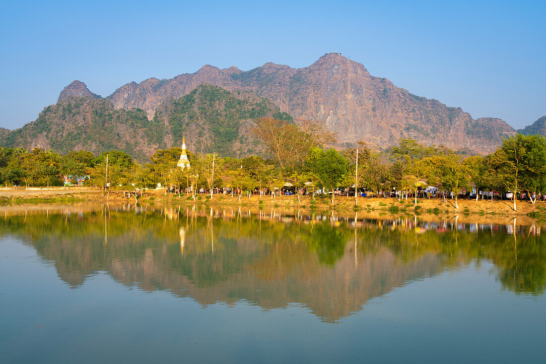 Lake by Kyaut Ka Latt Pagoda and mountain, Hpa-An, Myanmar (Burma), Asia