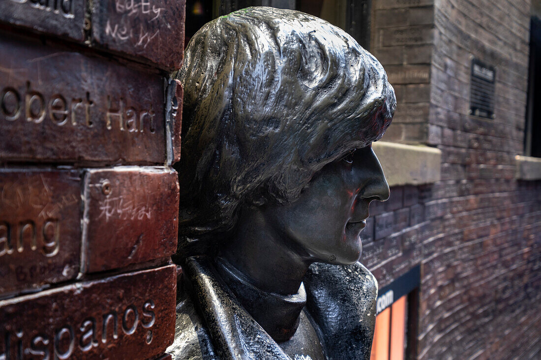 Detail of the John Lennon Statue outside the Cavern Pub, Matthew Street, Liverpool, Merseyside, England, United Kingdom, Europe