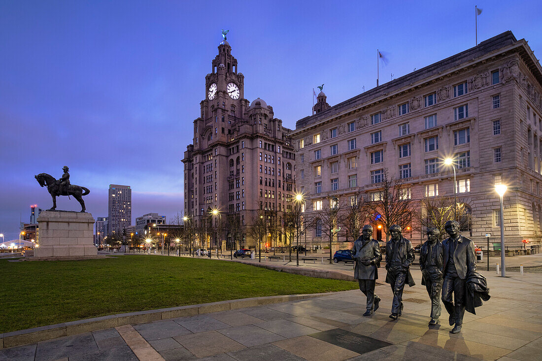 The Beatles Statue and Royal Liver Building at night, Pier Head, Liverpool Waterfront, Liverpool, Merseyside, England, United Kingdom, Europe