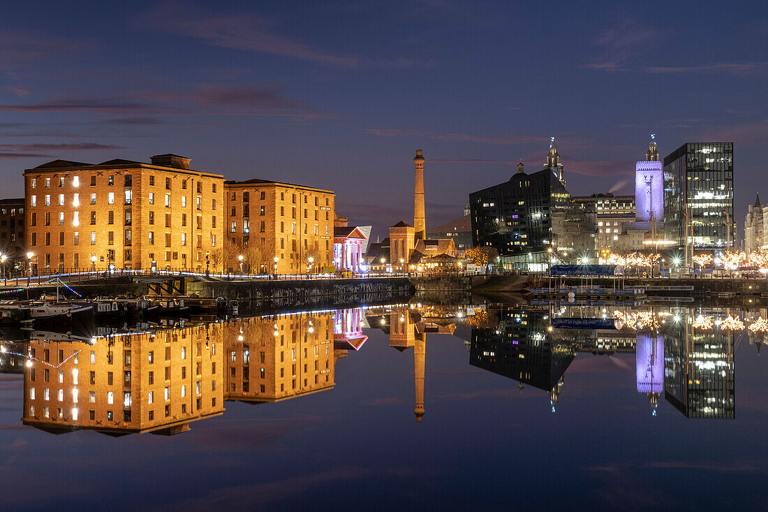 The Albert Dock, Pumphouse and Liverpool Waterfront reflected in Salthouse Dock at night, Liverpool, Merseyside, England, United Kingdom, Europe