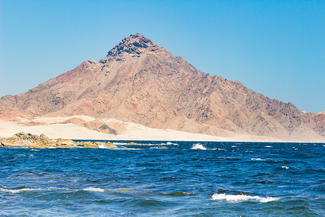 Mountain on coastline near Hasik, Dhofar Governorate, Oman, Middle East
