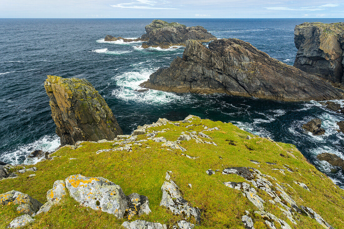 Sea stacks by Butt of Lewis lighthouse, Port of Ness, Island of Harris, Outer Hebrides, Scotland, United Kingdom, Europe