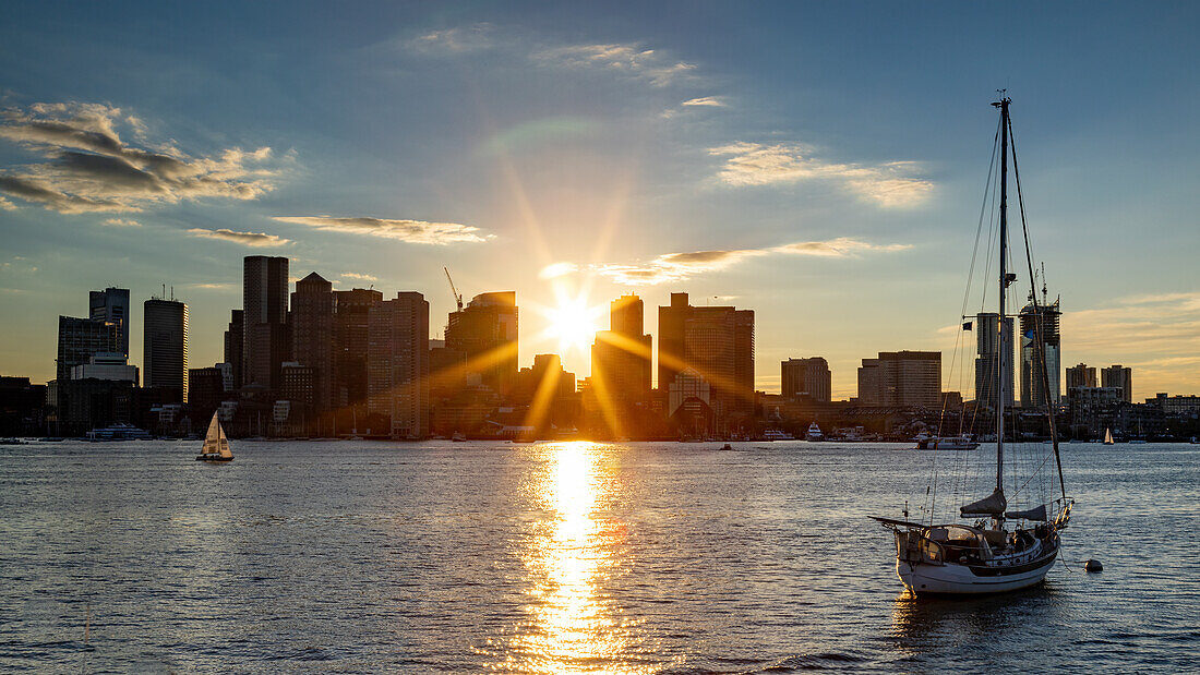 Sun flare over Boston from the East, Boston, Massachusetts, New England, United States of America, North America