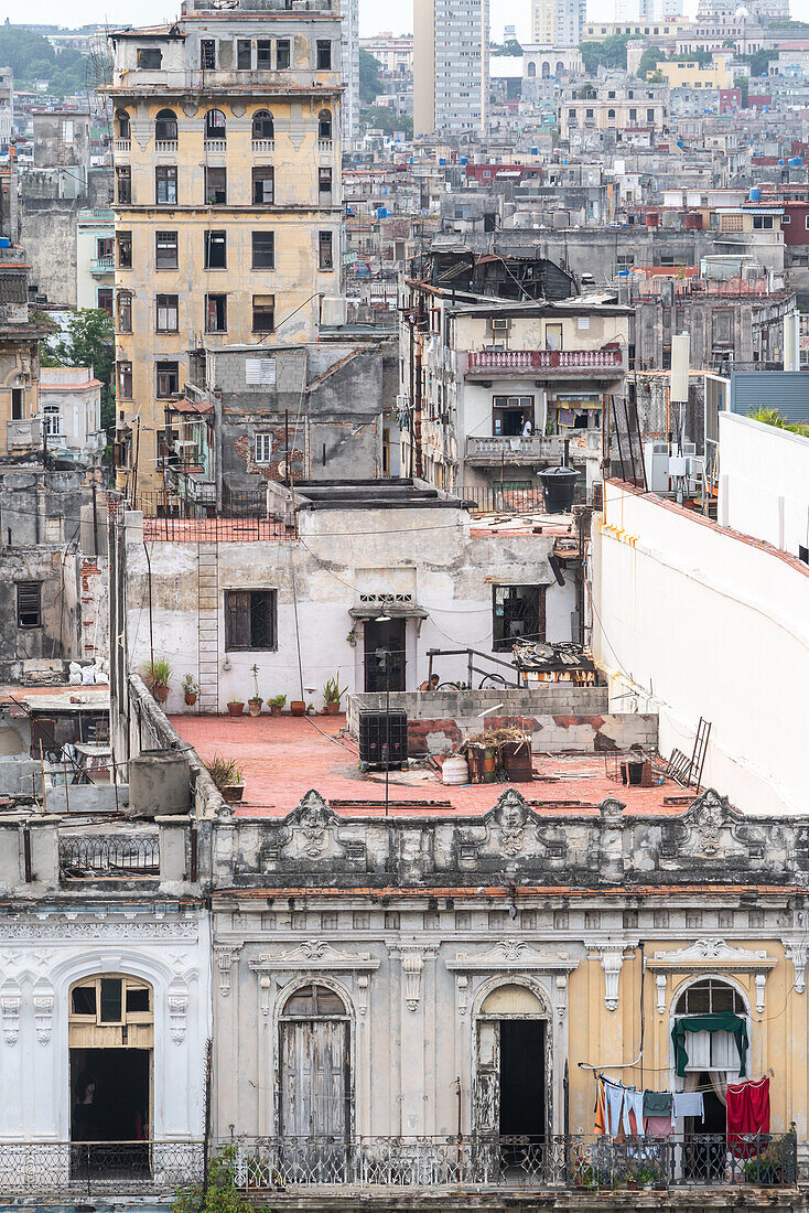 Aerial view of the dividing streets between Modern and Old Havana, with crumbling houses in foreground, Havana, Cuba, West Indies, Caribbean, Central America