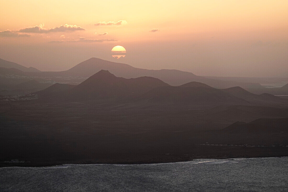 Sunset over the volcanic hills of Lanzarote, Canary Islands, Spain, Atlantic, Europe