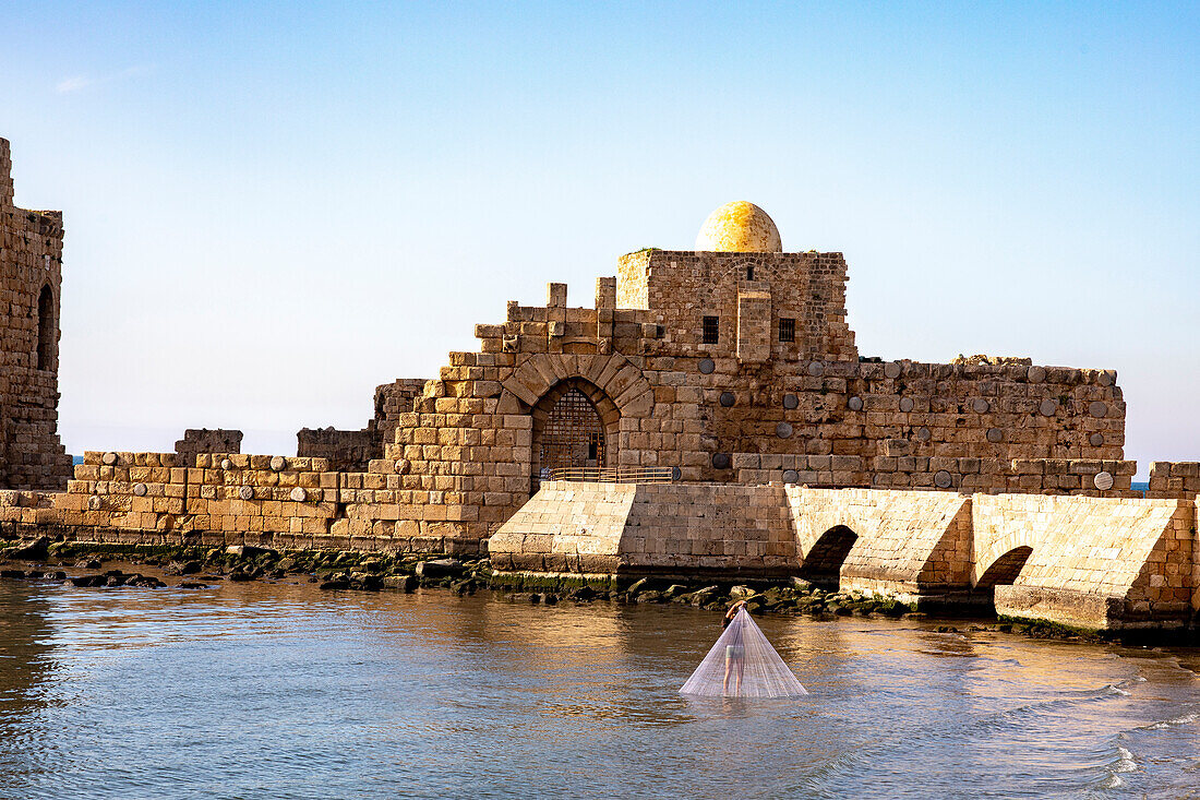 Fisherman near Saida fort, Lebanon, Middle East