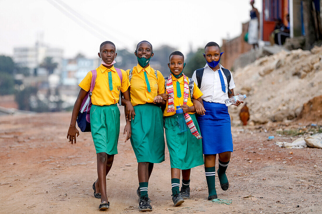 Children walking from school in Kigali, Rwanda, Africa