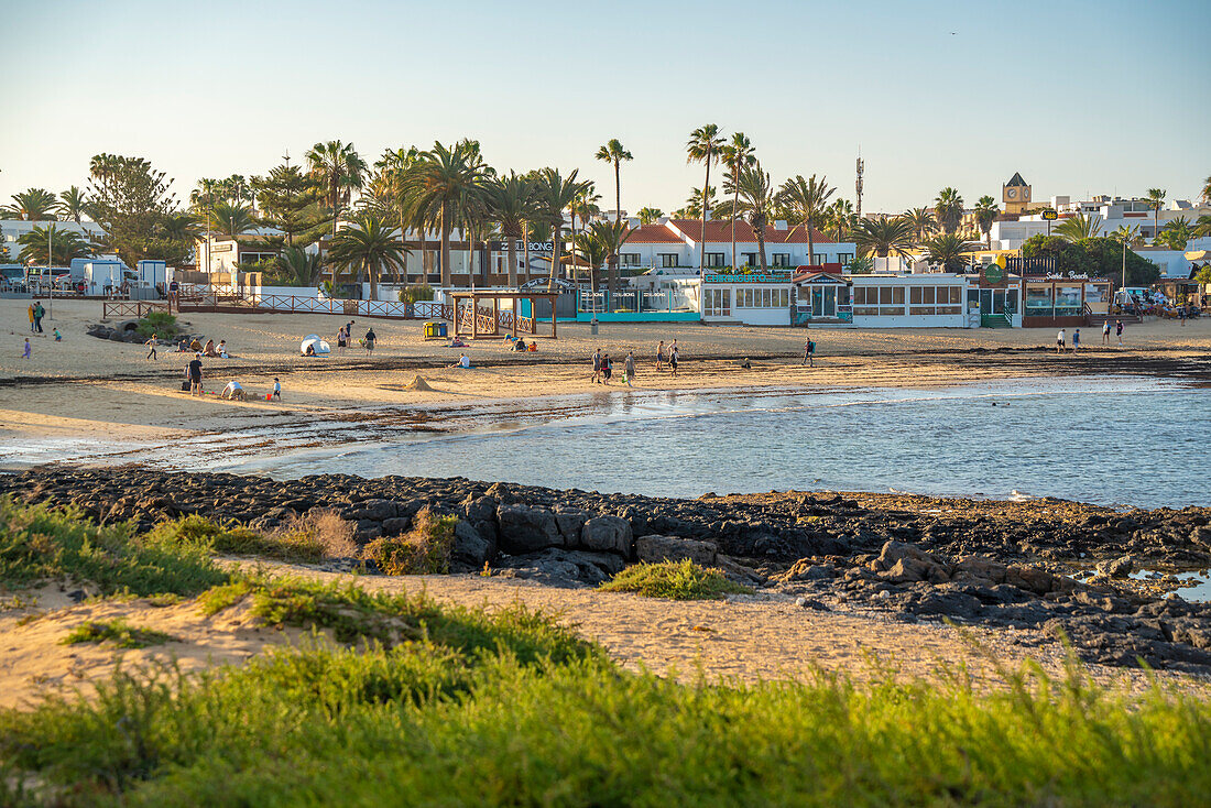 View of beach and town at sunset, Corralejo, Fuerteventura, Canary Islands, Spain, Atlantic, Europe