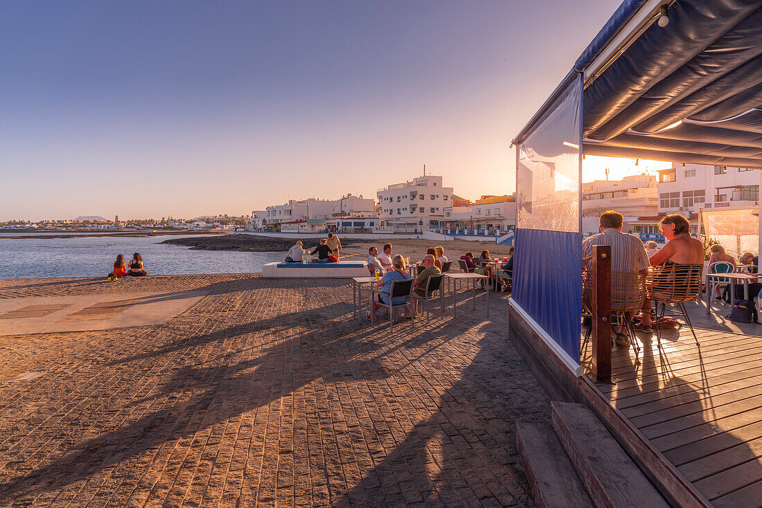 View of beach and bars on a sunny day, Corralejo, Fuerteventura, Canary Islands, Spain, Atlantic, Europe