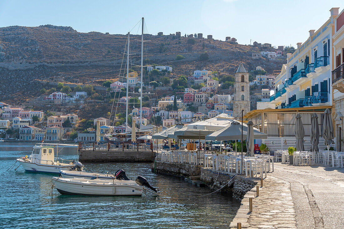 View of boats in harbour of Symi Town, Symi Island, Dodecanese, Greek Islands, Greece, Europe