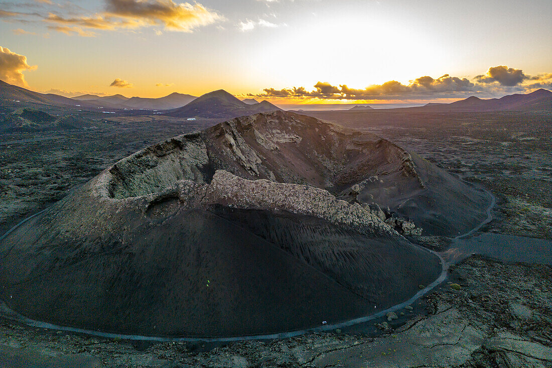 Aerial view of El Cuervo Volcano at sunset, Timanfaya National Park, Lanzarote, Las Palmas, Canary Islands, Spain, Atlantic, Europe
