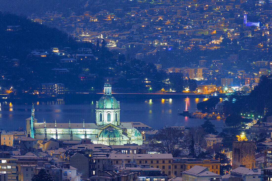 A night view on Como city after the snowfall, Como's cathedral, lake Como, Lombardy, Italy, Europe