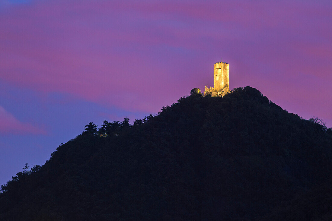 Baradello tower (Castel Baradello) illuminate at Dusk, Como city, lake Como, Lombardy, Italy, Europe