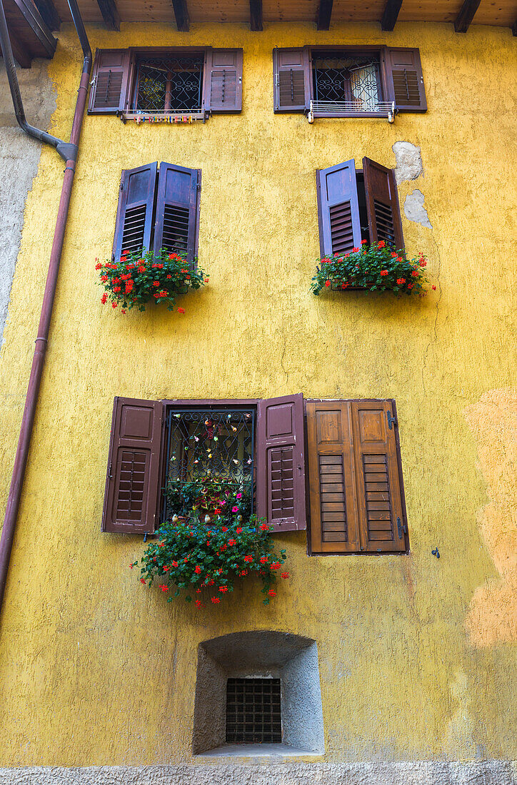 A facade of a home, Pellizzano village, Sole valley (val di Sole), Trento province, Trentino-Alto Adige, Italy, Europe