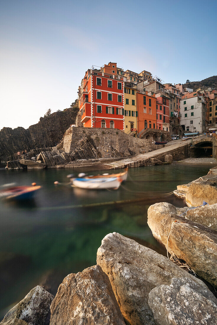 a long exposure to capture the sunset from the riomaggiore harbor, National Park of Cinque Terre, municipality of Riomaggiore, UNESCO WORLD HERITAGE SITE, La Spezia province, Liguria district, Italy, Europe