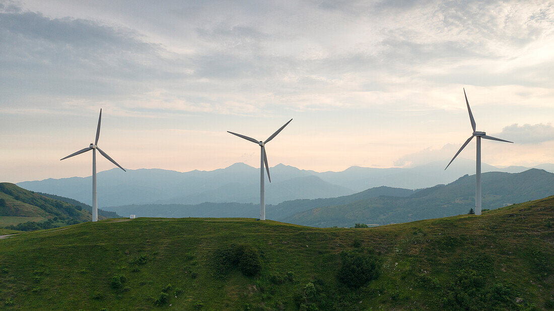 Aerial view of the Cappelletta Pass with wind turbine in summer day, municipality of Albareto, Parma province, Emilia Romagna district, Italy, Europe