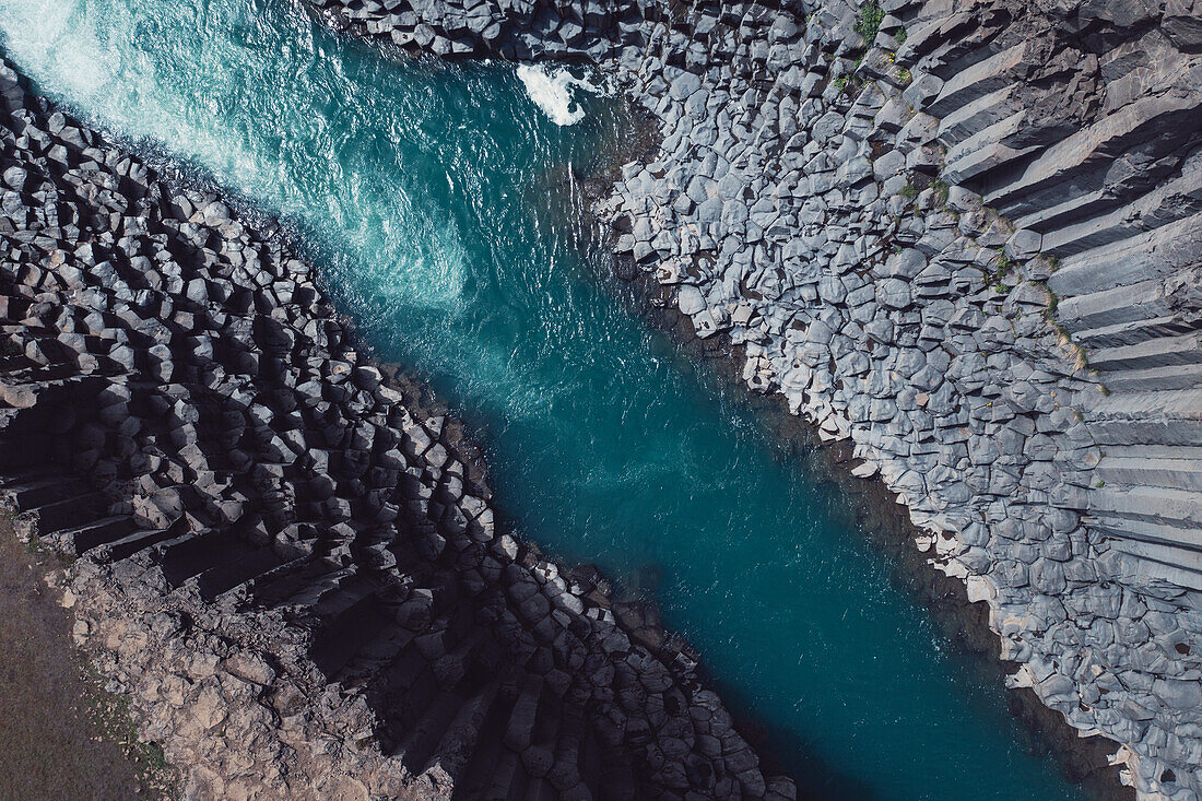 aerial view taken by drone of Studagil canyon, during a summer day, Austurland, Eastern Iceland, Iceland, Europe.