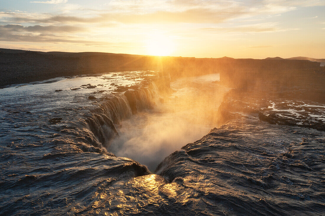 the sunset, taken by drone, at Selfoss waterfall with a midnight sun, Nordurland, Iceland, Europe