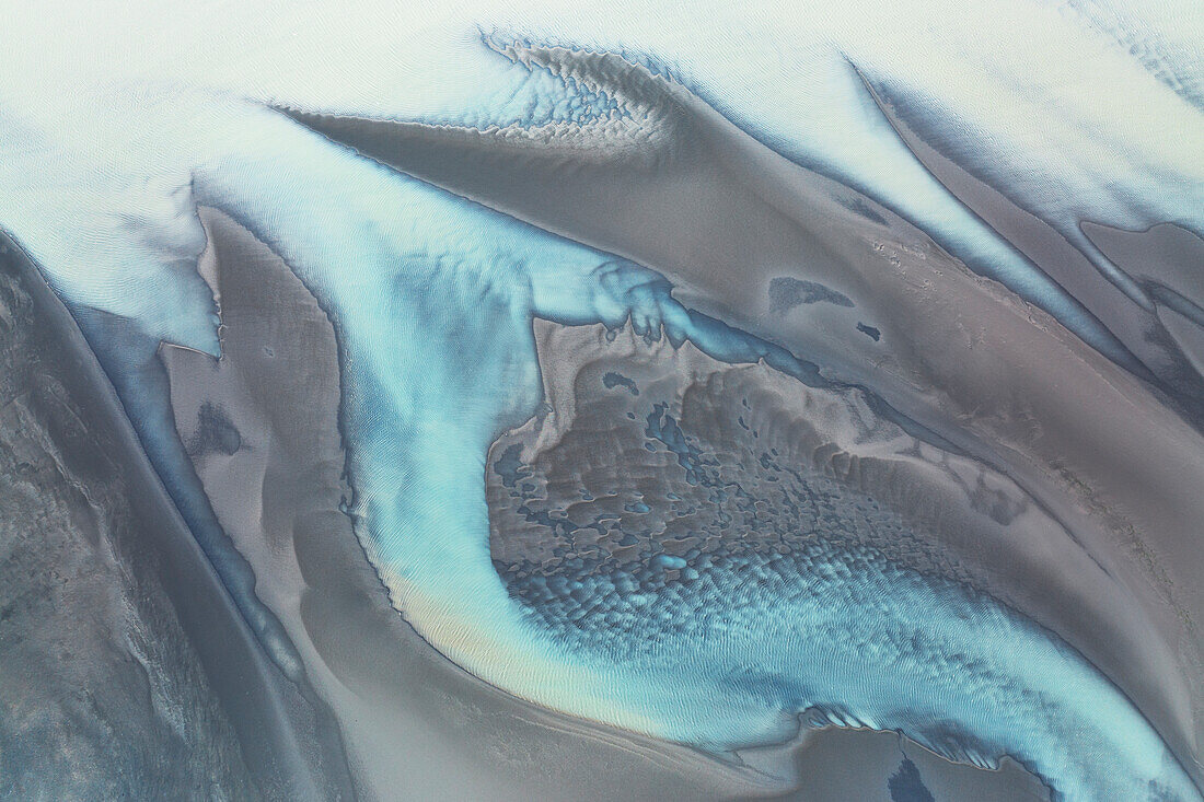 aerial abstract taken by drone of icelandic river during a winter day, Austurland, Iceland, Europe