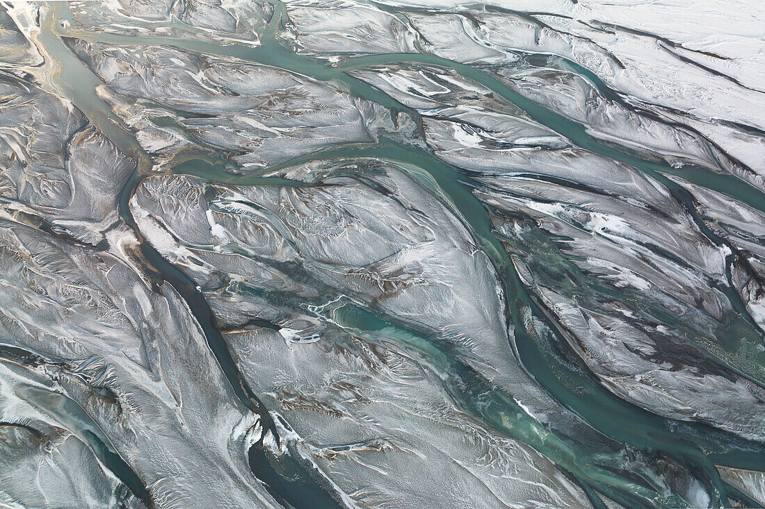 aerial abstract taken by drone of icelandic river during a winter day, Austurland, Iceland, Europe