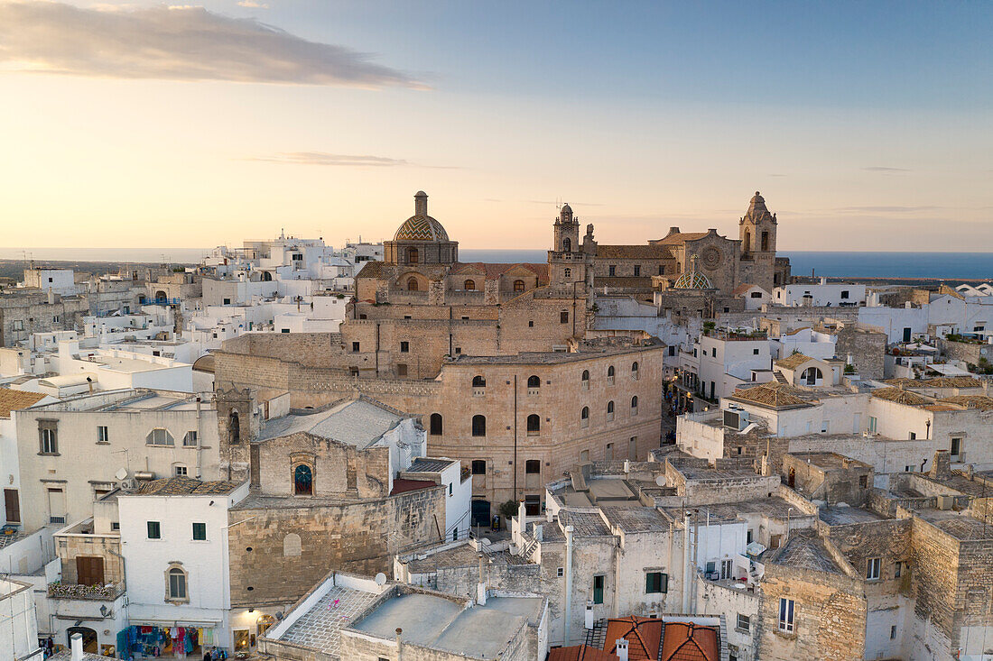aerial view of Ostuni, so called "the white city", during a summer sunset, municipality of Ostuni, Brindisi province, Apulia district, Italy, Europe