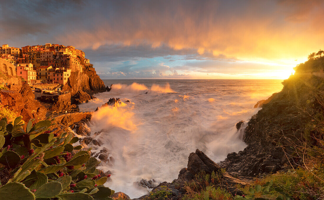 Epic autumn sunset in fisherman village of Manarola, National Park of Cinque Terre, UNESCO World Heritage Site, municipality of Riomaggiore, La Spezia province, Liguria district, Italy, Europe