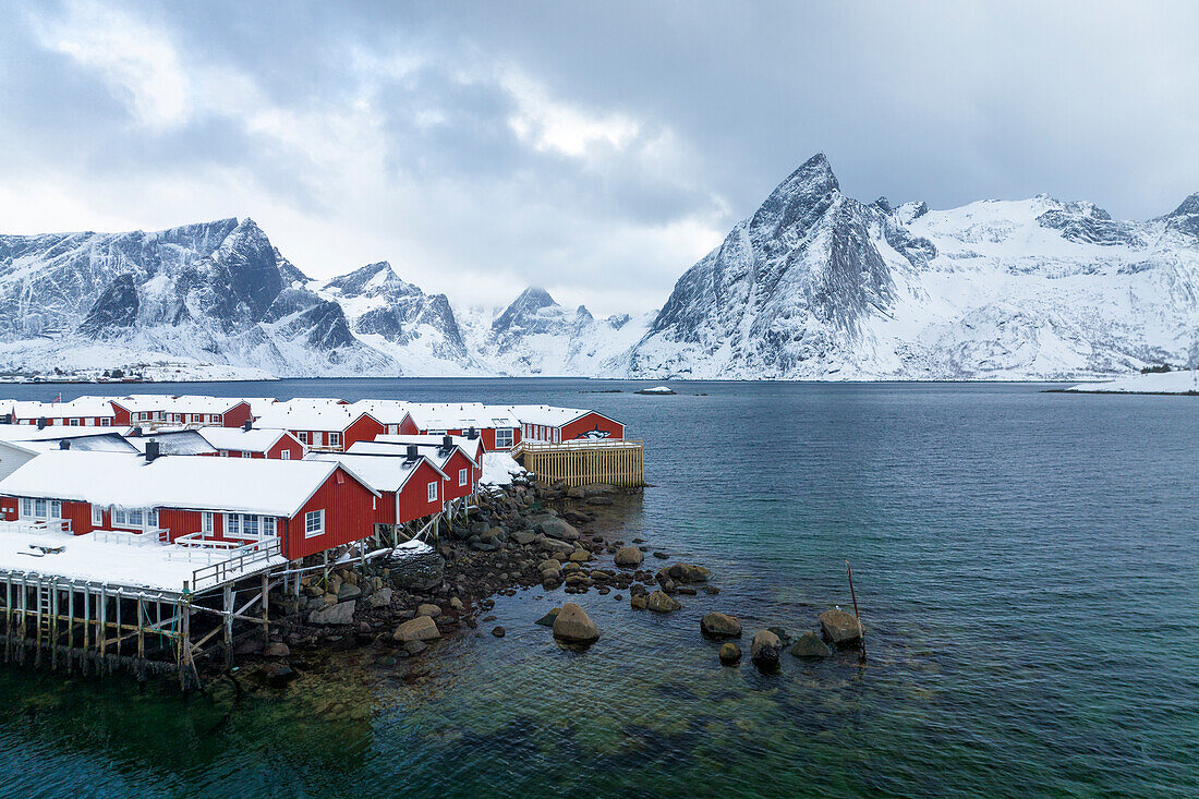 Winter day in Hamnoy village with Olstind peak covered with snow, Lofoten Islands, Norway, Europe