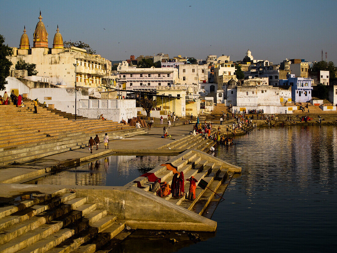 Pilgrims praying at the ghats in the Pushkar lake