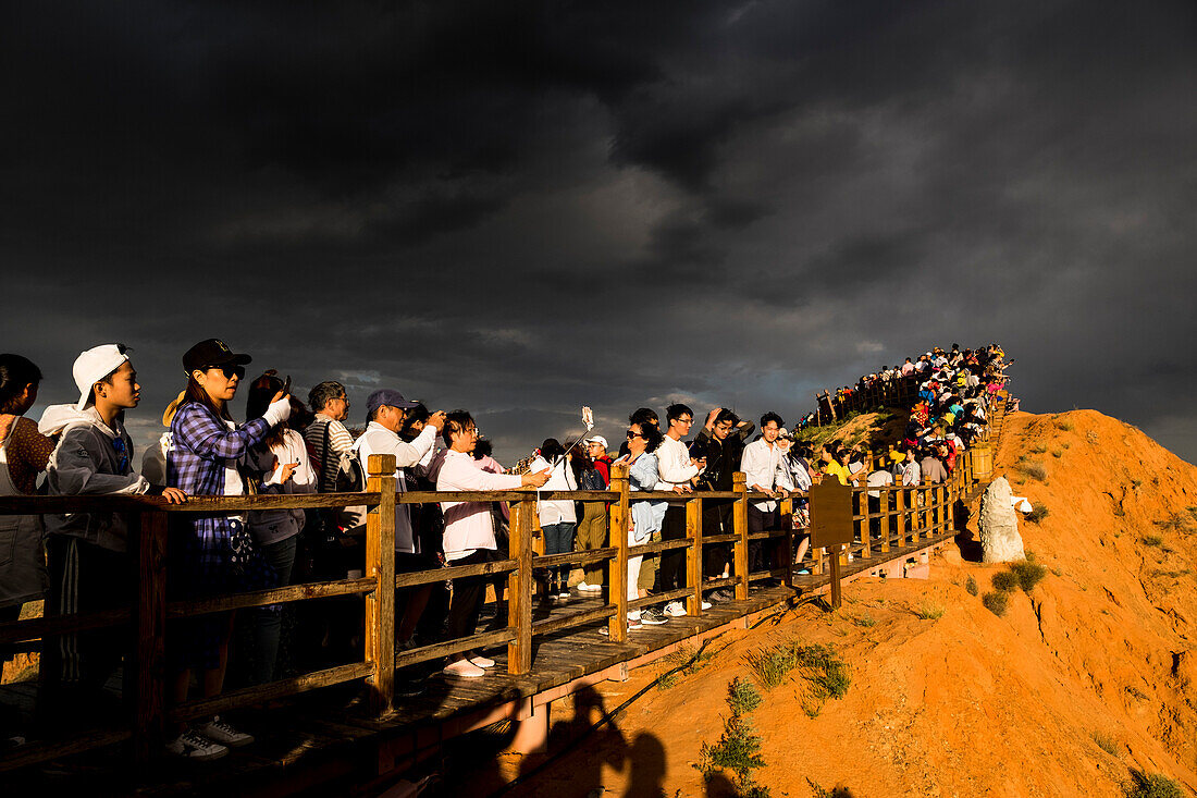 Chinese tourists visit the Rainbow Mountains of Zhangye Danxia National Geological Park