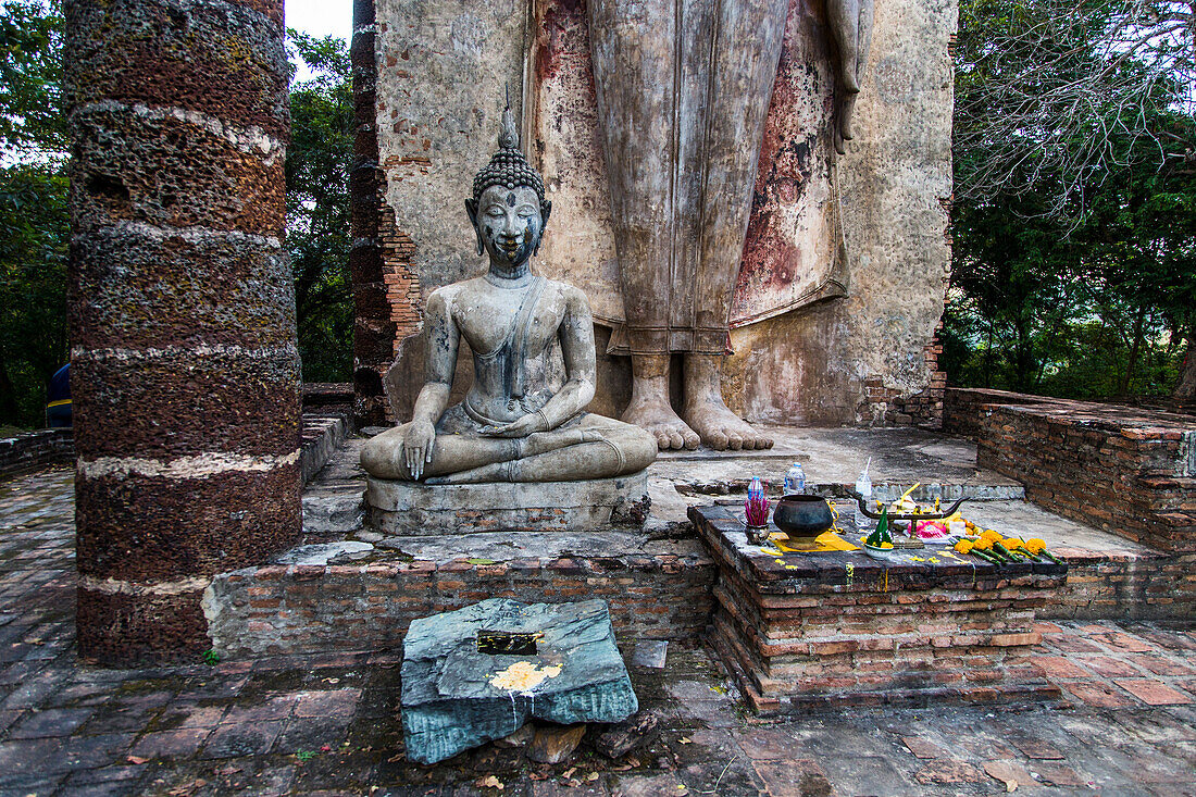 Archaeological site, ruins and Buddha statue in Sukhotai