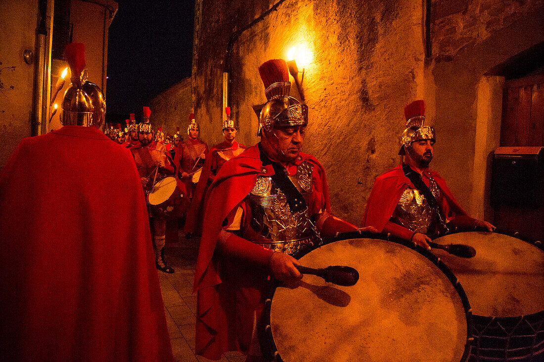 Verges, a small town in the Northeast of Catalonia (Spain), during Easter celebrates the Procession of Verges with skeletons dancing on the sound of a drum, Roman soldiers, known as the 'Manages', and a representation of the life and crucifixion of Jesus Christ. The Procession features the Dance of Death, a tradition from the Middle Age associated with epidemics and plagues and the only one remaining in Spain. Ten skeletons dance to the beat of a drum to remember that no one is exempt of death. The backdrop of the medieval walls and towers of Verges is key to this macabre staging.