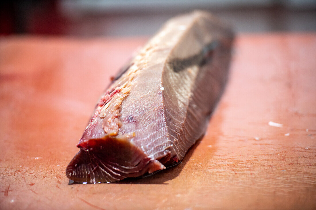 Cutting and prepping fish for canning process, Fish canning factory (USISA), Isla Cristina, Spain