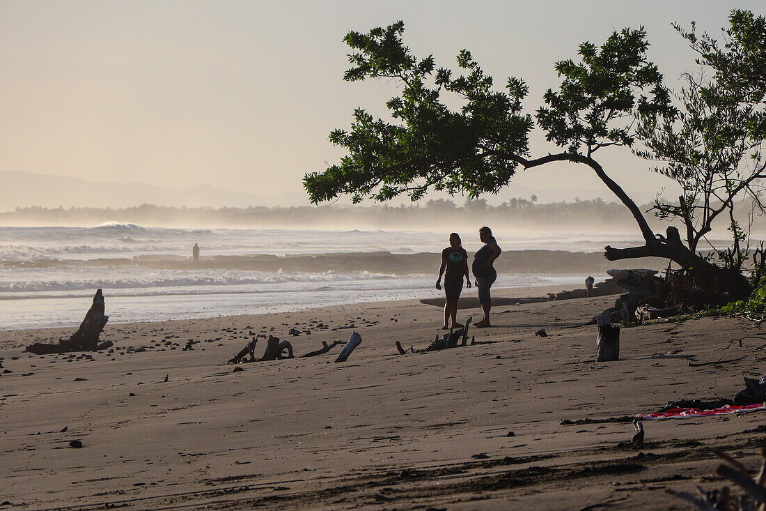 Two women in Jiquilillo beach, Chinandega, Nicaragua