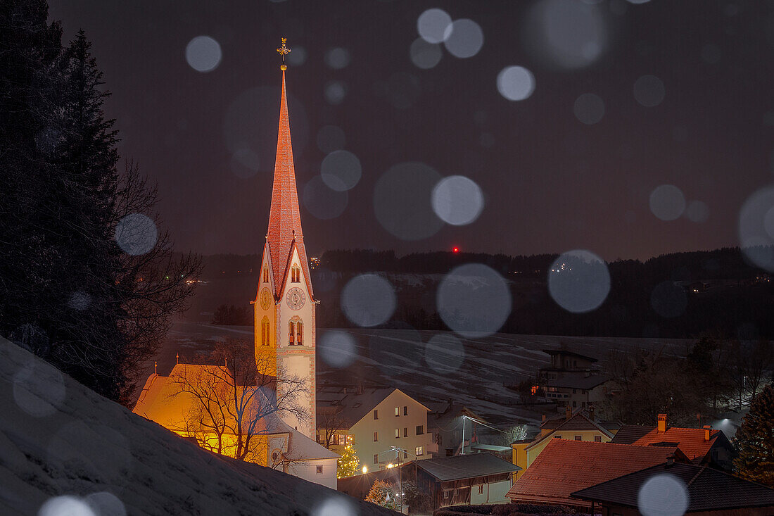 The parish church of Vill on a snowy evening, Vill, Innsbruck, Tyrol, Austria, Europe
