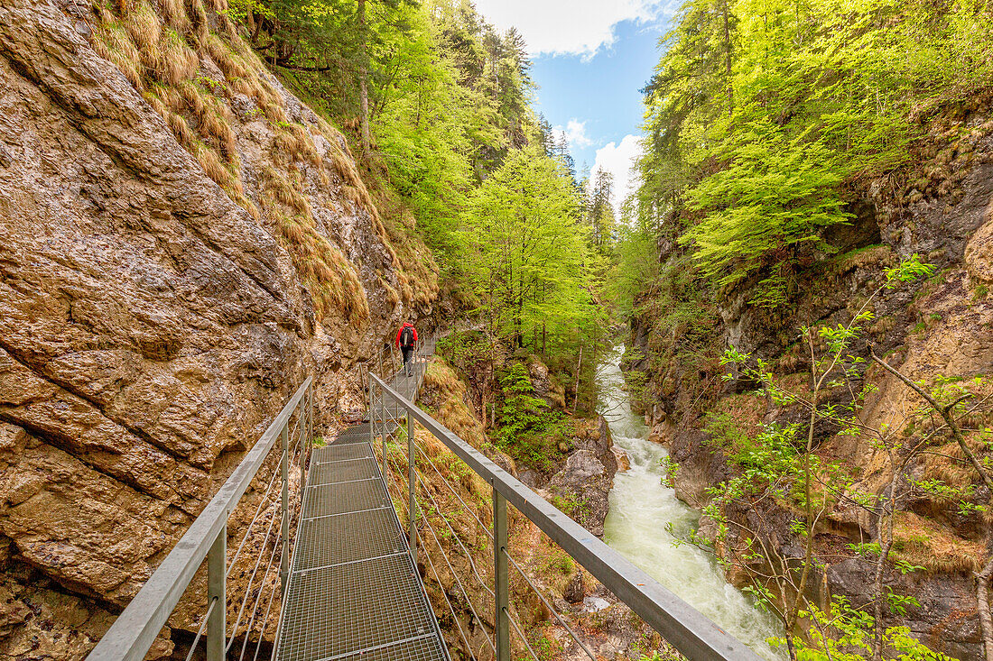 A man hiking through the Kaiser Gorge, Aschau, Brandenberg region, Kufstein district, Tyrol, Austria, Europe