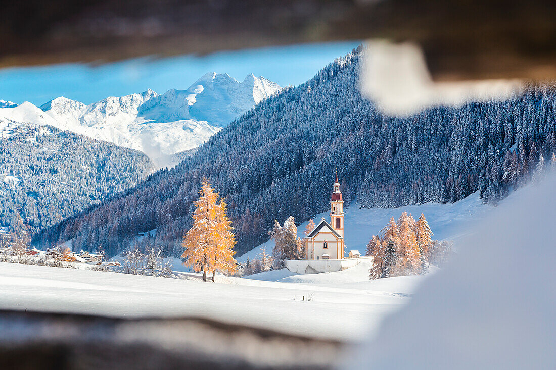 The parish church of St. Nikolaus after a heavy snowfall, Obernberg am Brenner, Innsbruck Land, Tyrol, Austria, Europe