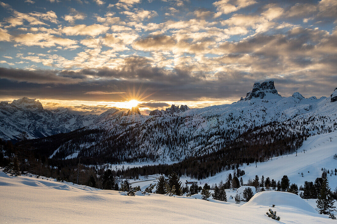 Italy, Veneto, province of Belluno,the sun rises behind the Cinque Torri