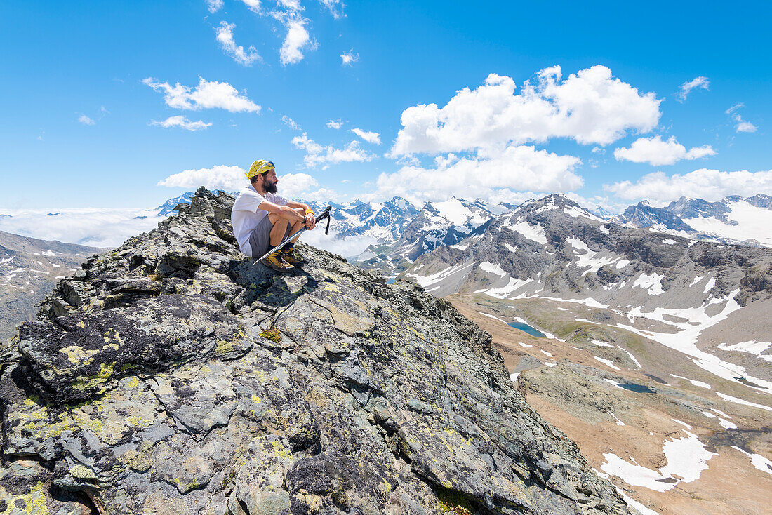 Alpinist on top, Punta Bes, Valle dell Orco, Gran Paradiso National Park, Italian alps, Province of Turin, Piedmont, Italy