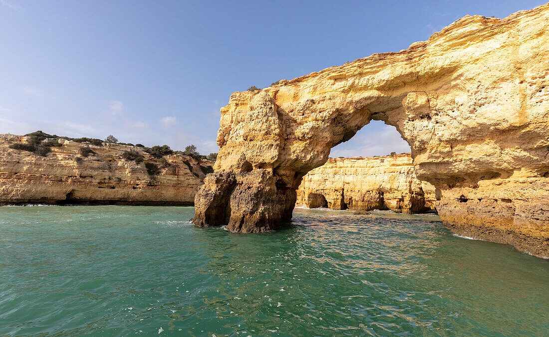 View from the sea of Natural arch of Albandeira, Porches village, Faro district, Algarve, Portugal