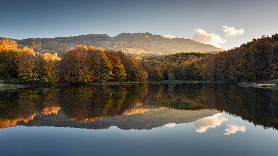 Autumn reflections on Pranda Lake, tuscan-emilian apennine national park, municipality of Ventasso, Reggio Emilia province, Emilia-Romagna district, Italy, Europe