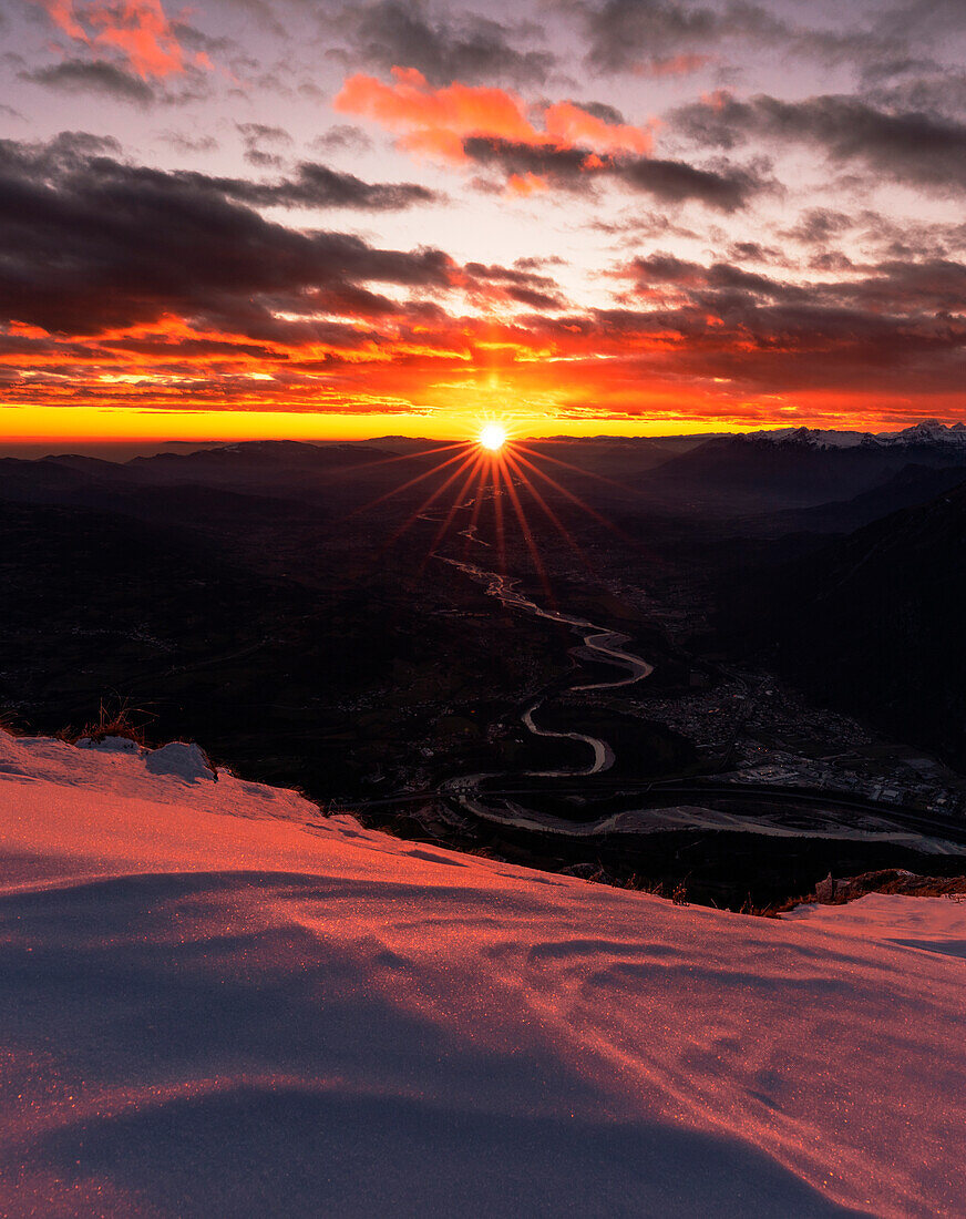 Sunset on the top of Dolada Mount, in Alpago mountain range, Veneto, Italy